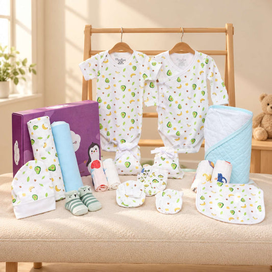 Mom's Home newborn hospital kit with 20 organic cotton baby essentials in avocado print, displayed in a nursery